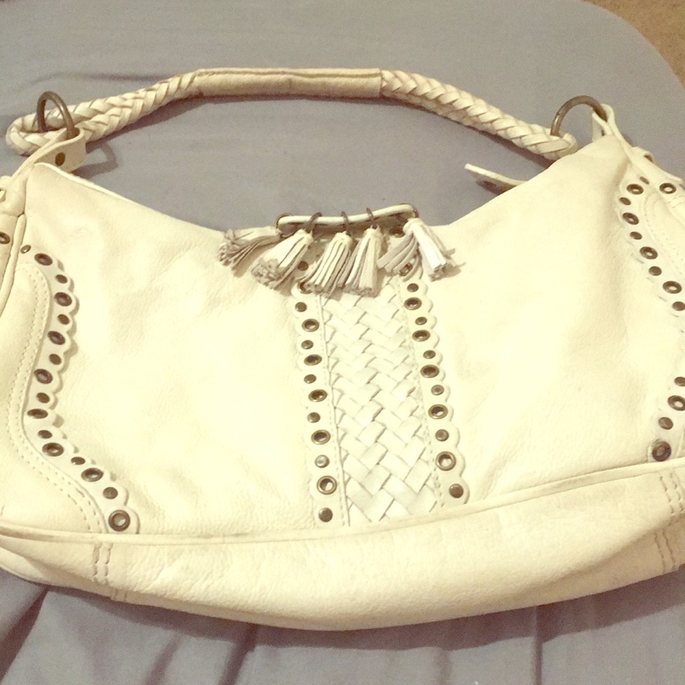 A white Wilson’s Leather purse
